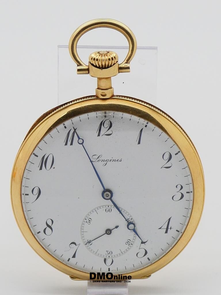 Gold pocket watch with white dial and blue hands, Longines, displayed on a stand